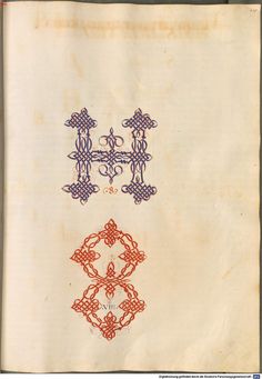 an old book with two designs on it