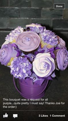 purple and white flowers in a bucket with the text, this bouquet was request for all purple