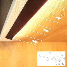 an angled view of a wooden surface with measurements for the top and bottom section, along with arrows pointing in different directions