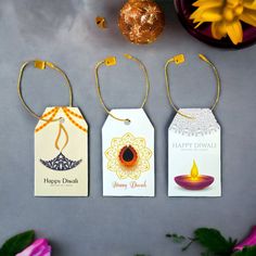 three tags with happy diwali designs on them