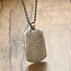 The Dog Tag Pendant Necklace Oxidized is an elegant piece of jewellery created from oxidized stainless steel that is durable and won't tarnish over time. This elegant necklace features a rectangle shape pendant with a minimalistic stainless steel chain that will go well with any casual or formal outfit. 
Materials:

Stainless Steel

Dimensions:

Pendant: 0.9 * 1.6 in /  2.3 * 4 cm

Necklace Length: 19.6 in / 50 cm Military Dog Tag, Military Dog, Dog Tags Military, Dog Tag Pendant, Bracelet Viking, Metal Tags, Us Military, Necklace For Men, Military Inspired