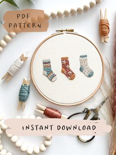 an embroidery kit with three socks on it and the words instant download written below