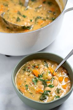 two bowls filled with soup next to each other