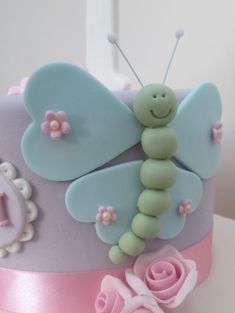 there is a cake that has a butterfly on it