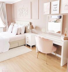 a bedroom with a bed, desk and chair in it's centerpieces