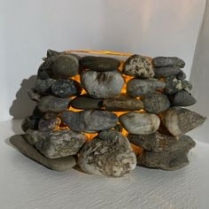 a pile of rocks sitting on top of a white table