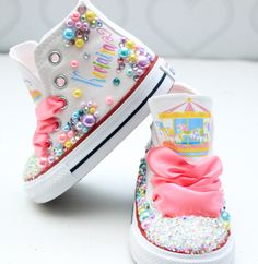 How adorable are these Carousel inspired converse! The perfect shoe to complete the look! Please leave your name needed in the notebox during checkout Visit the tutu section or search bar for the matching outfit! If you are unsure of sizing please scroll to the last photos for our size charts, or visit our size charts here--> https://pinktoesnhairbows.com/pages/size-chart All sales are FINAL, Ship dates can be found directly on the listing, please view our policies in detail here---> https://pinktoesnhairbows.com/pages/policies-terms-conditions Shoe Carousel, Girls Converse