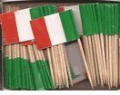 several matches are stacked on top of each other with the flag of italy painted on them