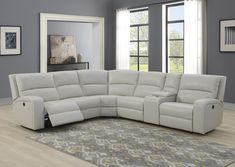 a large white sectional sofa in a living room