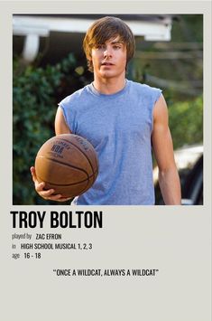 a young man holding a basketball on top of a white sheet with the words troy borton