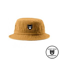 Summer is here, and it's time to protect that head of yours. This stylishly designed bucket hat gives off those summer vibes all while providing cloud-like comfort. Throw on some shades and hit the beach looking cool as a cucumber with our badass sleepy bucket hat. Features Fabric sweatband Roll up shape Unisex Vintage dyed look 4 Brass Eyelets Self-fabric Sweatband Embroidered patched Logo (1.5x1.5) Size Chart Crown Height 8.5 CM Brim Length 4.5 CM For environmental reasons, this Product is mad Summer 5-panel Bucket Hat For Beach, Summer Beach 5-panel Bucket Hat, Adjustable Summer Bucket Hat For Everyday, Adjustable Summer Bucket Hat For Everyday Wear, Casual Summer Outdoor Bucket Hat, Casual Beach Sun Hat 5-panel, Casual 5-panel Sun Hat For Beach, Casual 5-panel Sun Hat For The Beach, Adjustable 5-panel Bucket Hat For Vacation