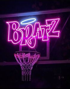 a neon sign that says brazz above a basketball hoop