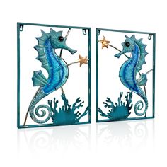 two metal seahorses with starfish on their tails are shown against a white background