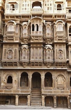 an old building with many balconies and windows