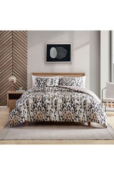 a leopard print comforter set in a bedroom