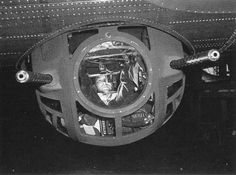 an old photo of a man sitting in the cockpit of a plane