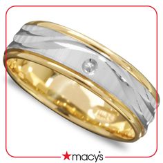 two tone gold and silver wedding band with diamond in the center, on white background