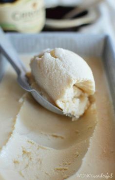 a scoop of vanilla ice cream in a container