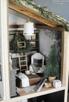 a doll house with furniture and decorations on the shelves, including a ladder leading up to a chair