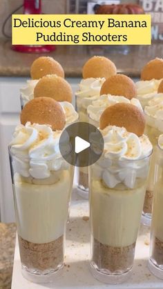 there are many desserts in small cups on the table with words delicious creamy banana pudding shooters