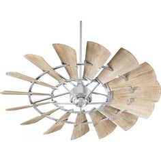 a ceiling fan with wooden blades hanging from it's center point on a white background