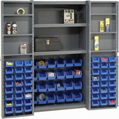 two shelves with blue bins on each side and one shelf filled with plastic containers