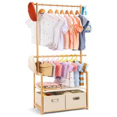 a wooden rack with clothes on it and two drawers underneath the rack is an umbrella