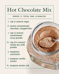 the ingredients for hot chocolate mix in a glass jar on a white background with text