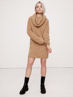 An invitation to play with proportions, this soft and warm sweater dress is cut with an oversized silhouette and a dramatic, funnel neck so you can drape and style as you please.  For fabric, we reached for one of our favorite fuzzy yarns, spun from a blend of luxurious alpaca.  Oversized fit.  Funnel neck.  Slip-on styling.  Unlined.  Oversized fit.  Long sleeves.  Above-knee length.  Model: Size S, 5'10" (178cm). Riddling Rack, Cinnamon Dolce Latte, Cinnamon Dolce, Invitation To Play, Warm Sweater, Warm Sweaters, Oversized Silhouette, Funnel Neck, Funnel