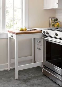 a kitchen with an oven, counter and sink