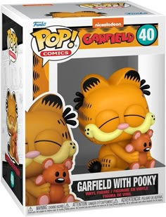 the pop vinyl figure garfield with pooky is shown in its box, and it has