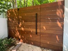 Custom hardwood IPE horizontal  gate Front Gate And Fence Ideas, Trellis Over Fence Gate, Wooden Horizontal Fence Gate, Modern Wood Gate Entrance, Horizontal Slat Privacy Fence, Side Fence With Gate, Horizontal Modern Fence, Mcm Fence Gate, Modern Wood Privacy Fence