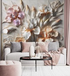 a living room with pink and white flowers on the wall