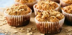 several muffins with oats on a table