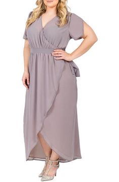 Notched tulip sleeves and a fluttery tulip hem enhance the fluid grace of a wrapped maxi dress cut from soft georgette. 60" length True wrap style; ties at waist Surplice V-neck Short sleeves Semi-sheer; base layer recommended Lined 100% polyester Machine wash, line dry Imported Encore Plus Size Wedding Guest Dresses, Plus Size Clothing Stores, Maxi Dress Plus Size, Storm Grey, Wrap Maxi Dress, Nursing Dress, Sleeveless Floral Dress, Tiered Maxi Dress, Plus Size Maxi Dresses