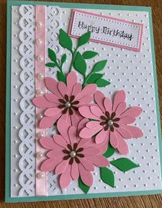 a birthday card with pink flowers on it