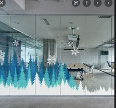 an office with frosted glass walls and snowflakes