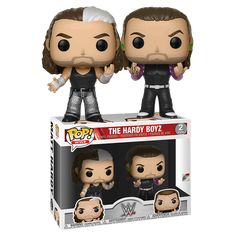 two pop vinyl figures are on top of a box