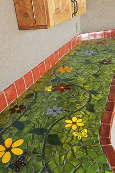 a tiled floor with flowers on it