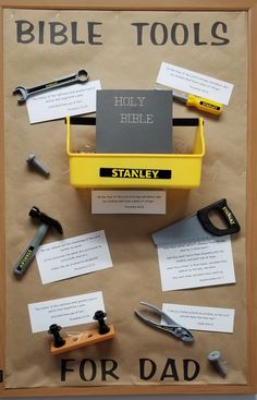 a bulletin board with tools on it and notes attached to the wall behind it that says, bible tools for dad