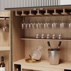 wine glasses and bottles are sitting on the shelves