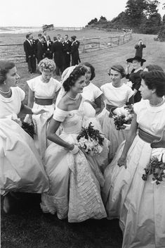 black and white photograph of bridesmaids in dresses