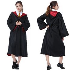 two women in graduation gowns standing side by side, one wearing a red and black stole