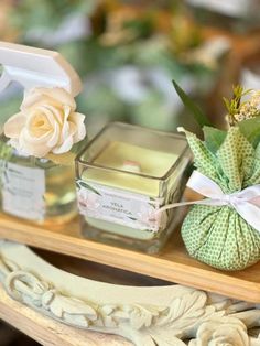 some candles and flowers on a table