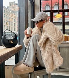 Cost Winter Outfits, Long Fluffy Coat Outfit, Fuzzy Trench Coat Outfit, Europe Winter Fashion Cold Weather Travel Outfits, Mob Wife Outfit Ideas, Fur Coat Outfit Casual, Winter Outfits White, Beige Fur Coat, Winter Hat Outfit