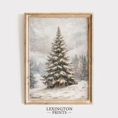 a painting of a snow covered pine tree in a frame on the wall with text saying,