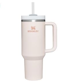 a white travel mug with a straw sticking out of it's top and the words stanley on it