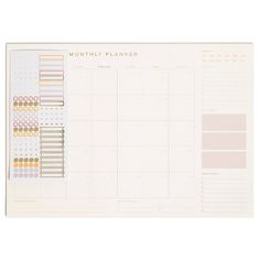 a white planner with pastel colors on it