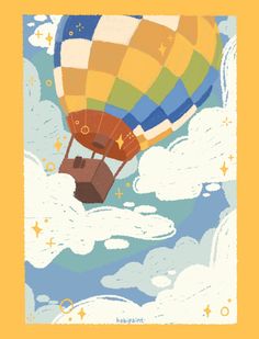 a colorful hot air balloon flying through the sky