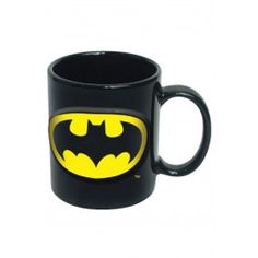 a black and yellow batman coffee mug with the logo on it's bottom half